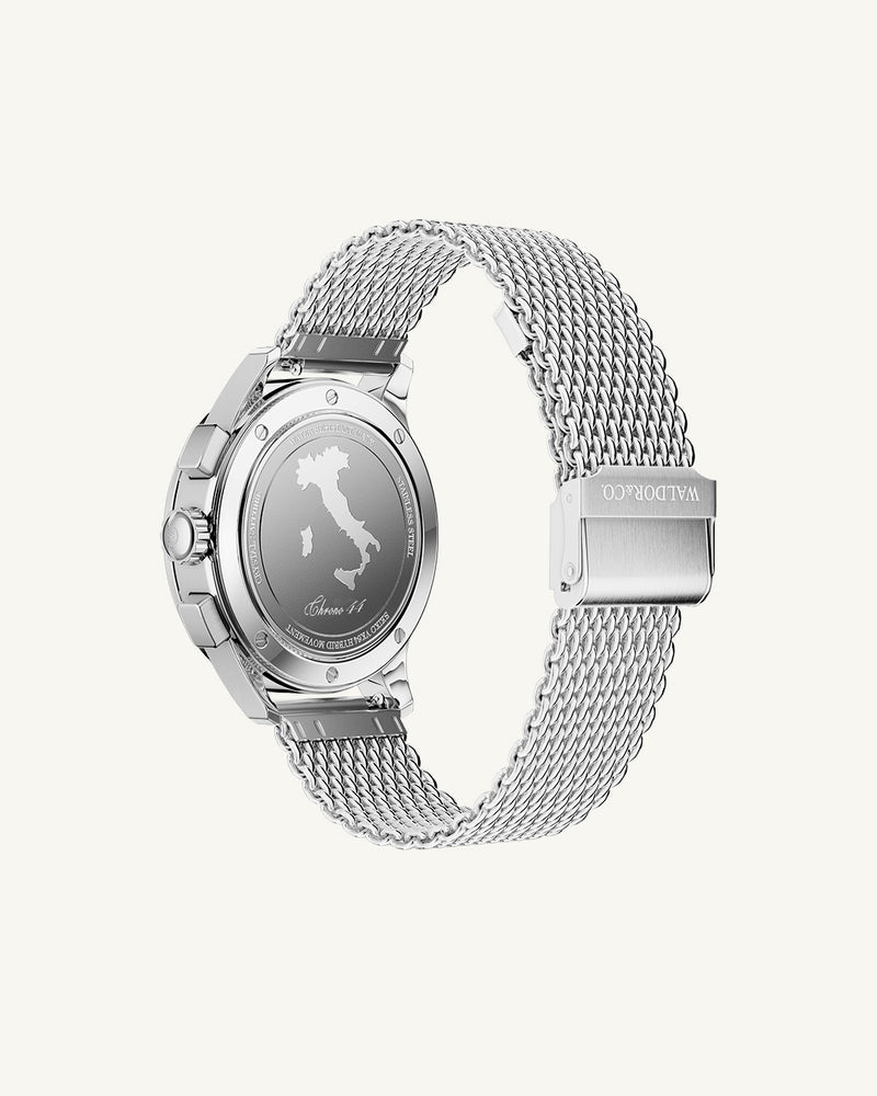 A round mens watch in rhodium-plated silver from Waldor & Co. with blue sunray dial and a second hand. Seiko movement. The model is Chrono 44 Sardinia 44mm.