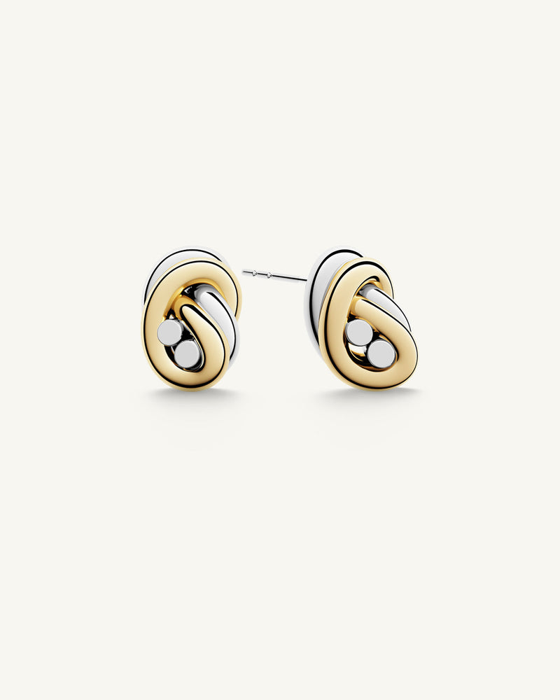 Earrings in silver and gold plated-316L stainless steel from Waldor & Co. The model is Dual Knot Earring Polished.