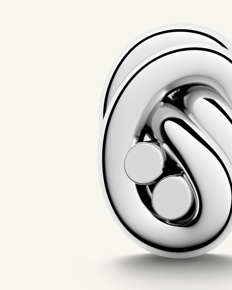 Earrings in silver plated-316L stainless steel from Waldor & Co. The model is Dual Knot Earring Polished.