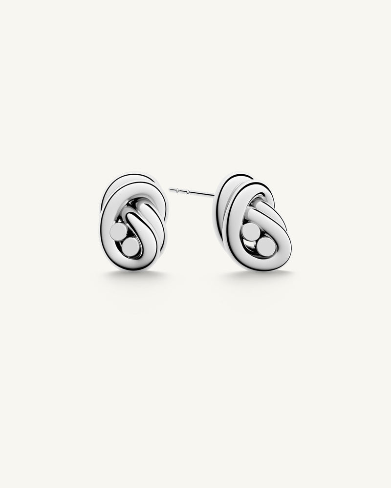 Earrings in silver plated-316L stainless steel from Waldor & Co. The model is Dual Knot Earring Polished.
