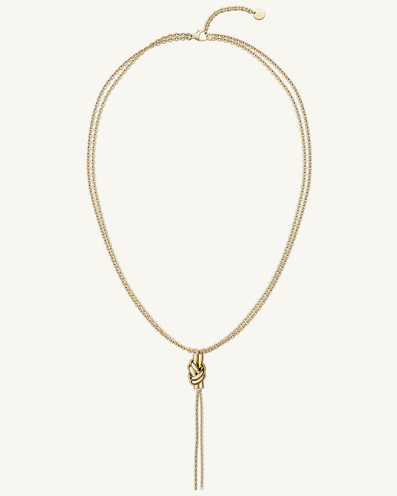 Necklace in gold plated-316L stainless steel from Waldor & Co. The model is Dual Knot Necklace Polished.