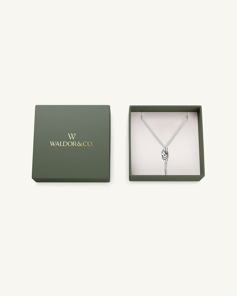 Necklace in silver stainless steel from Waldor & Co. The model is Dual Knot Necklace Polished.