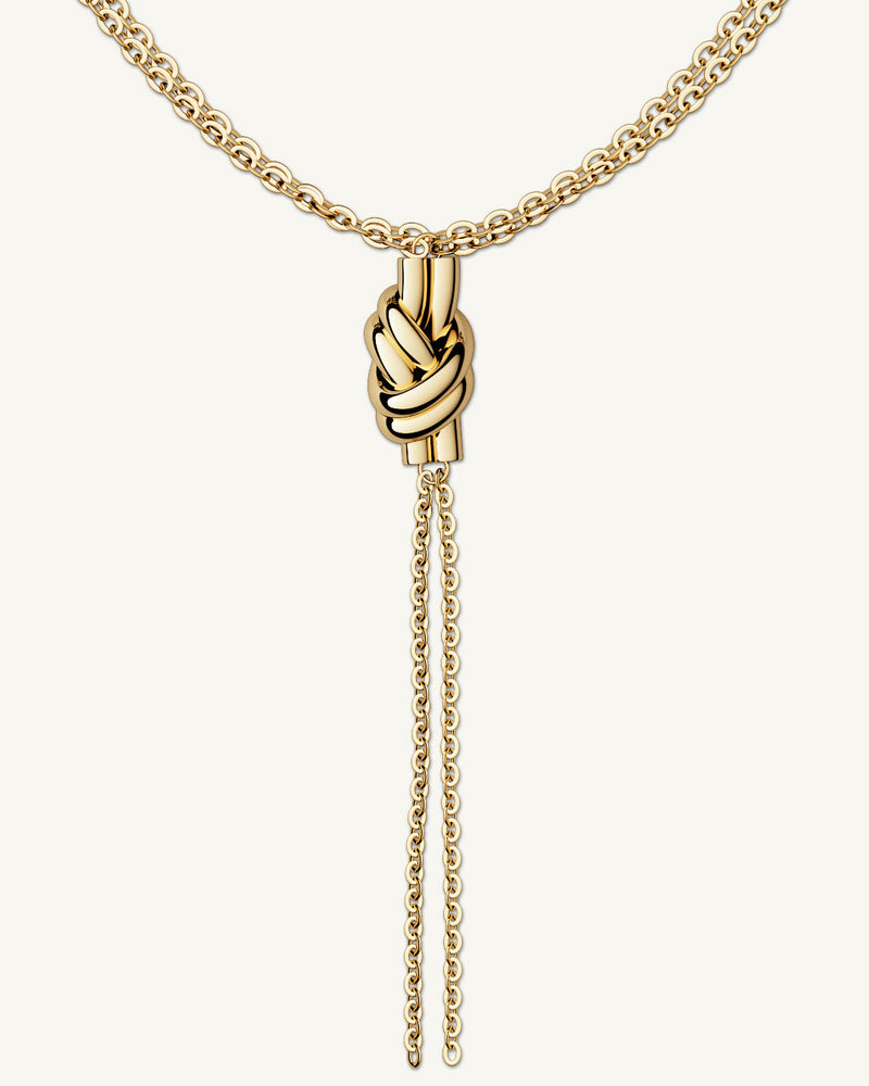 Necklace in gold plated-316L stainless steel from Waldor & Co. The model is Dual Knot Necklace Polished.