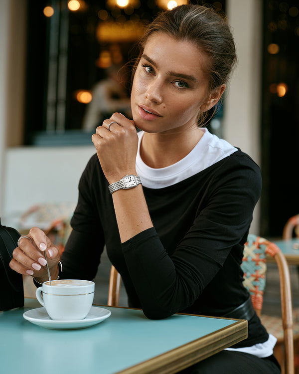  A square womens watch in Rhodium-plated 316L stainless steel from Waldor & Co. with white Diamond Cut Sapphire Crystal glass dial. Seiko movement. The model is Eternal 22 Bellagio.