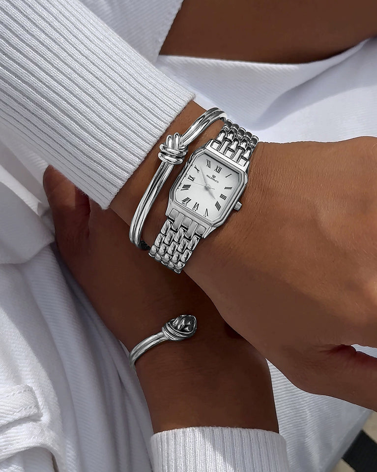  A square womens watch in Rhodium-plated 316L stainless steel from Waldor & Co. with white Diamond Cut Sapphire Crystal glass dial. Seiko movement. The model is Eternal 22 Bellagio.