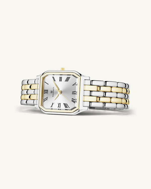 A square womens watch in 22k gold plated 316L stainless steel from Waldor & Co. with white Diamond Cut Sapphire Crystal glass dial. Seiko movement. The model is Eternal 22 Bellagio