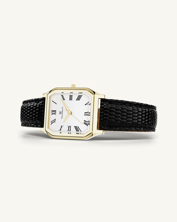 A square womens watch in 22 gold-plated 316L stainless steel with a black genuine leather strap from Waldor & Co. with white Diamond Cut Sapphire Crystal glass dial. Seiko movement. The model is Eternal 22 Varenna.