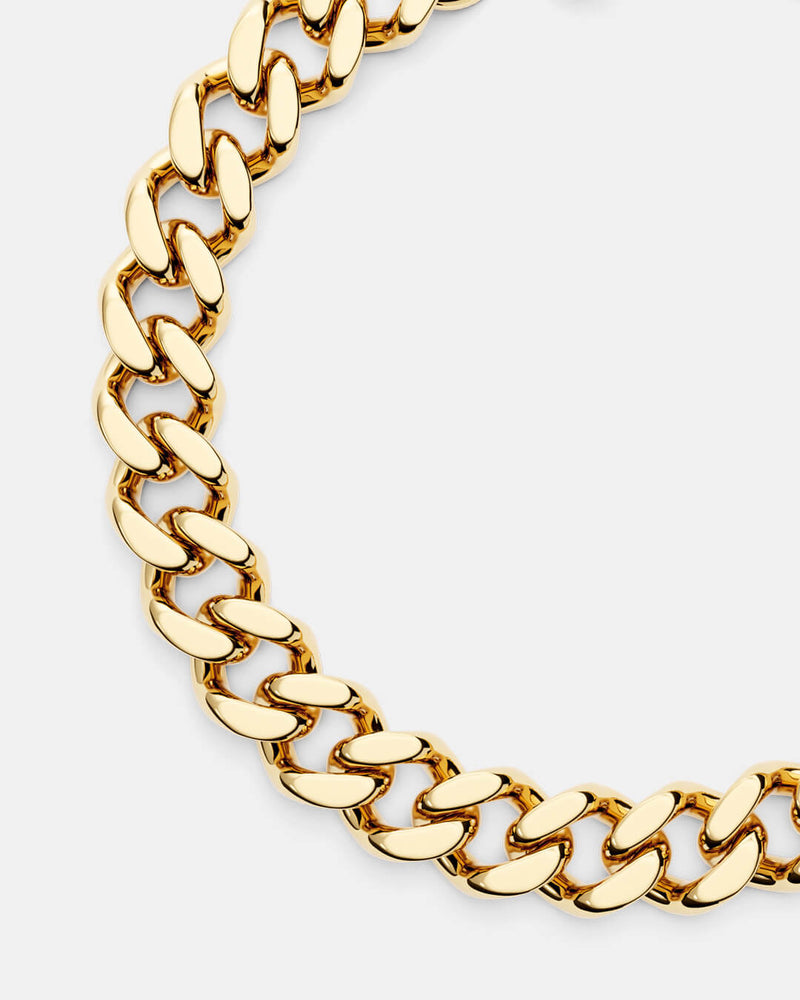 A polished stainless steel chain in 14k gold from Waldor & Co. One size. The model is Chunky Chain Polished 