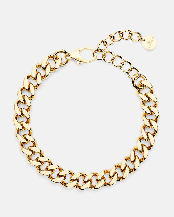 A polished stainless steel chain in 14k gold from Waldor & Co. One size. The model is Chunky Chain Polished 